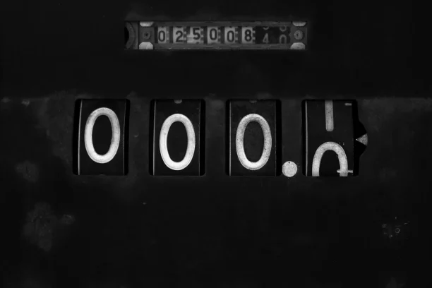 Vintage analog odometer displaying mileage numbers