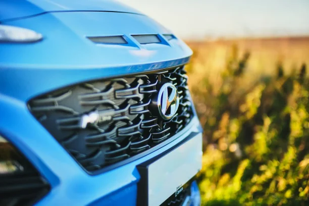 Hyundai vehicle front grille close up illustrating model involved in recurring camera and electronics defects.