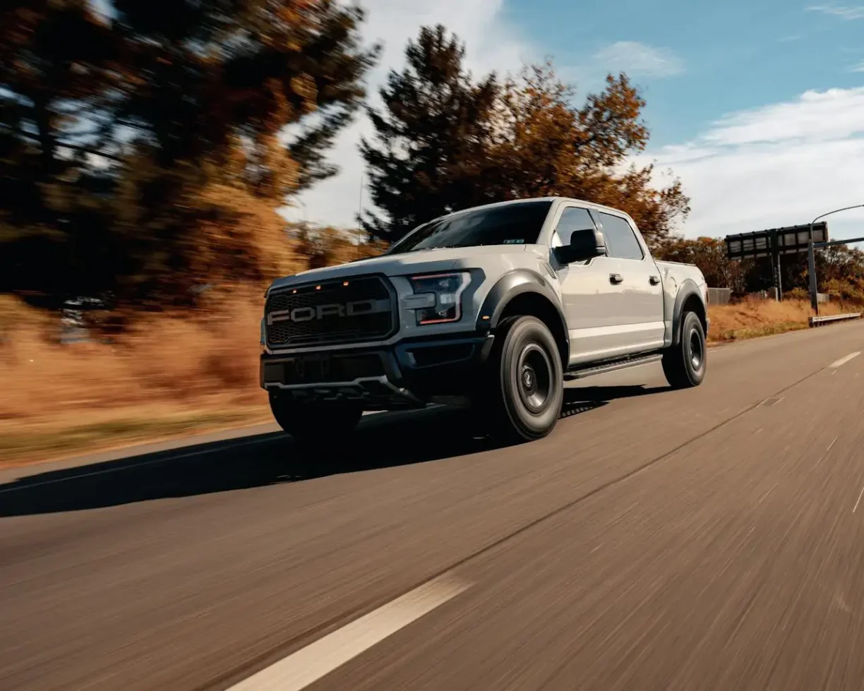 Ford pickup truck on the road representing vehicles commonly involved in lemon law disputes