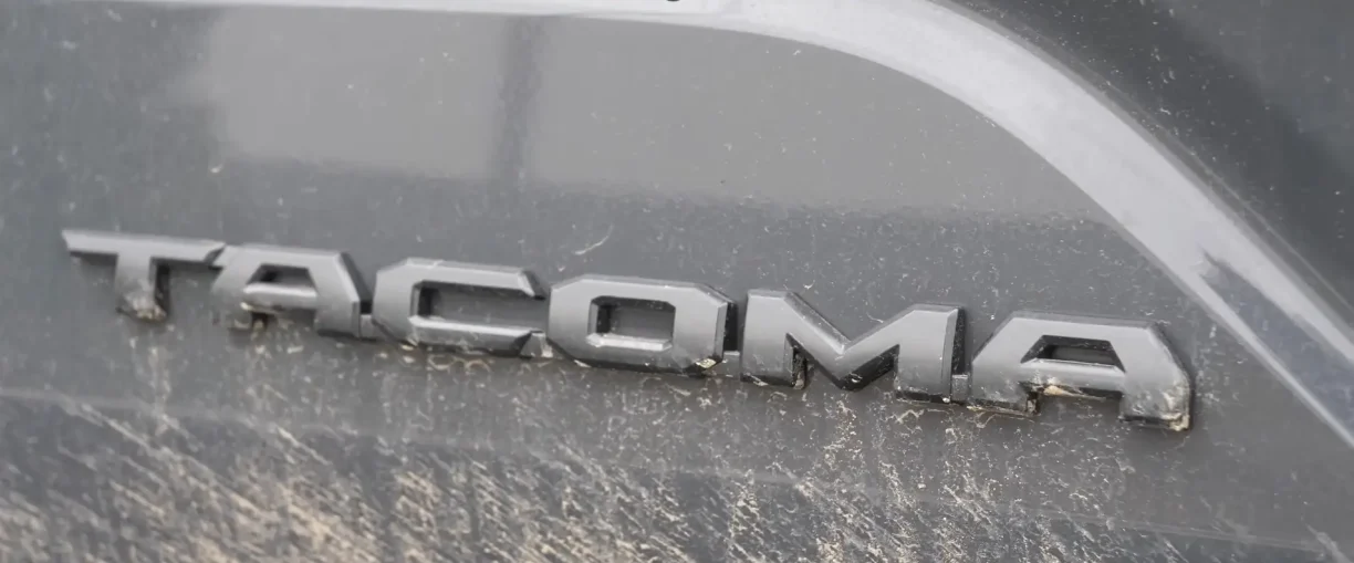 Toyota Tacoma pickup truck parked outdoors, showing off road ready exterior design