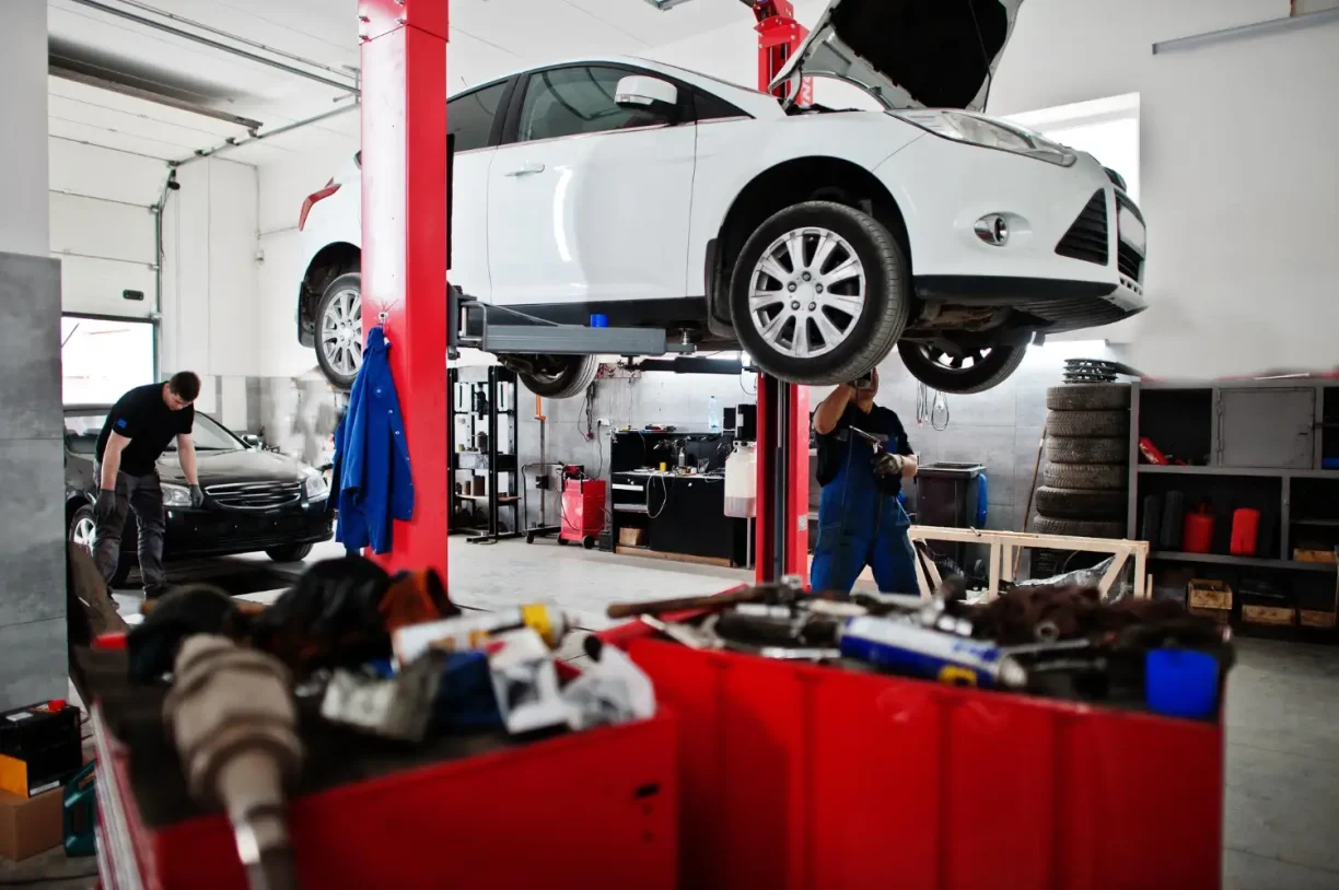 Mechanic diagnosing 2022 Lincoln Corsair problems at certified repair shop