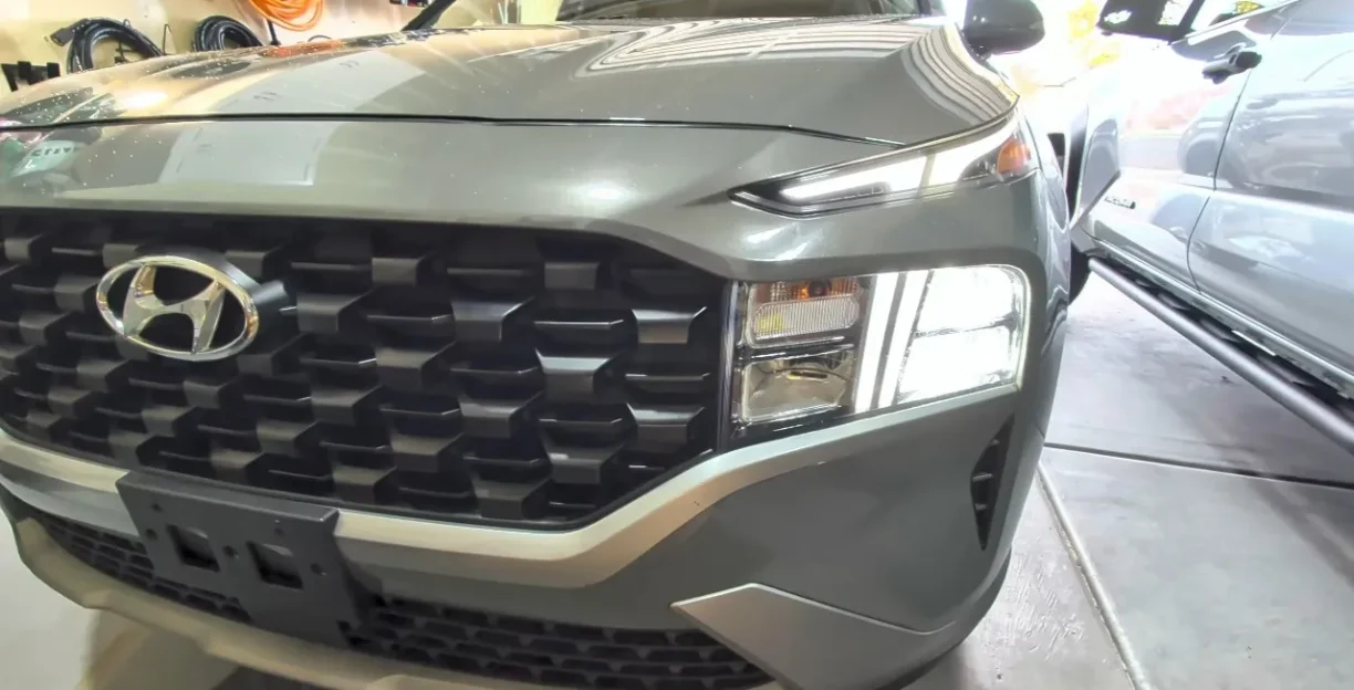 2023 Hyundai Santa Fe front grille at dealership repair shop during lemon law qualifying service visit